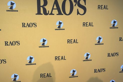 Rao's Crucial Catch step and repeat banner featuring Underdog Fantasy branding and REAL sponsorship logos